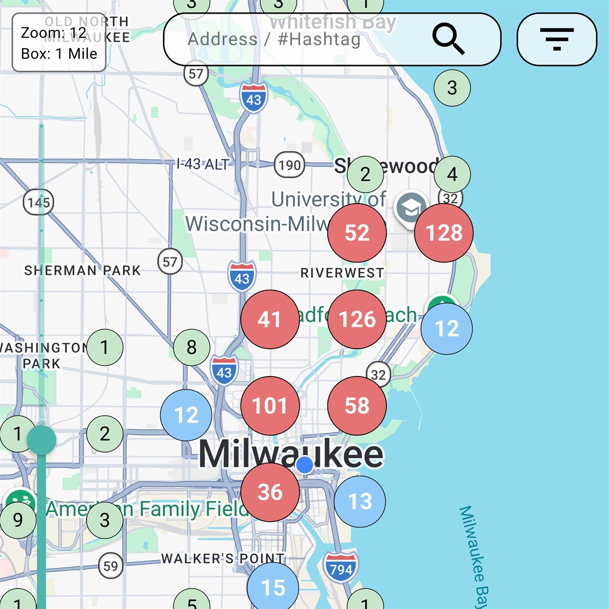 The Photer map over Milwaukee, each badge counting the photos pinned inside that one-mile grid square
